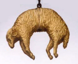 A standing live ram held by a hoisting belt