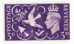 dove and olive branch on postage stamp